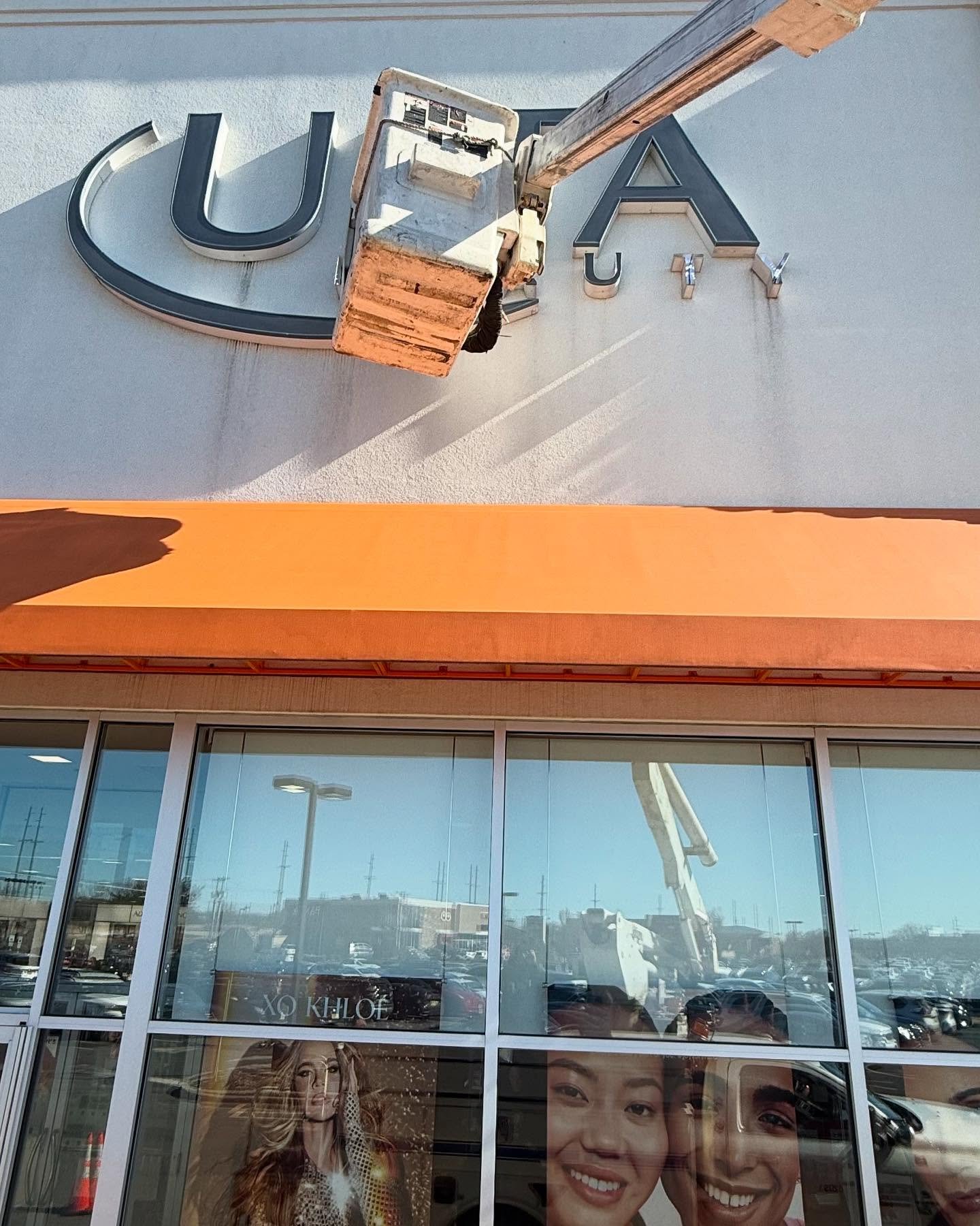 Bucket truck installing ULTA channel letters